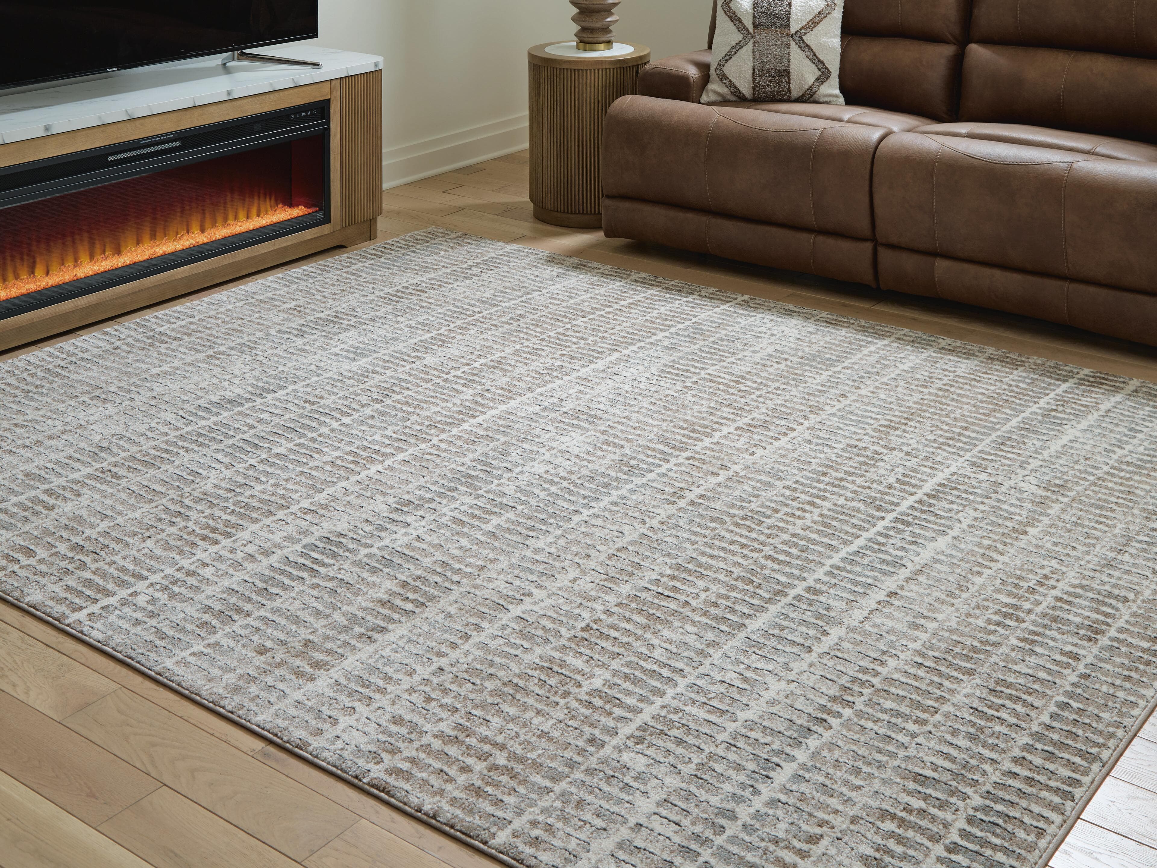 Fuadwick 7'10" X 10' Area Rug