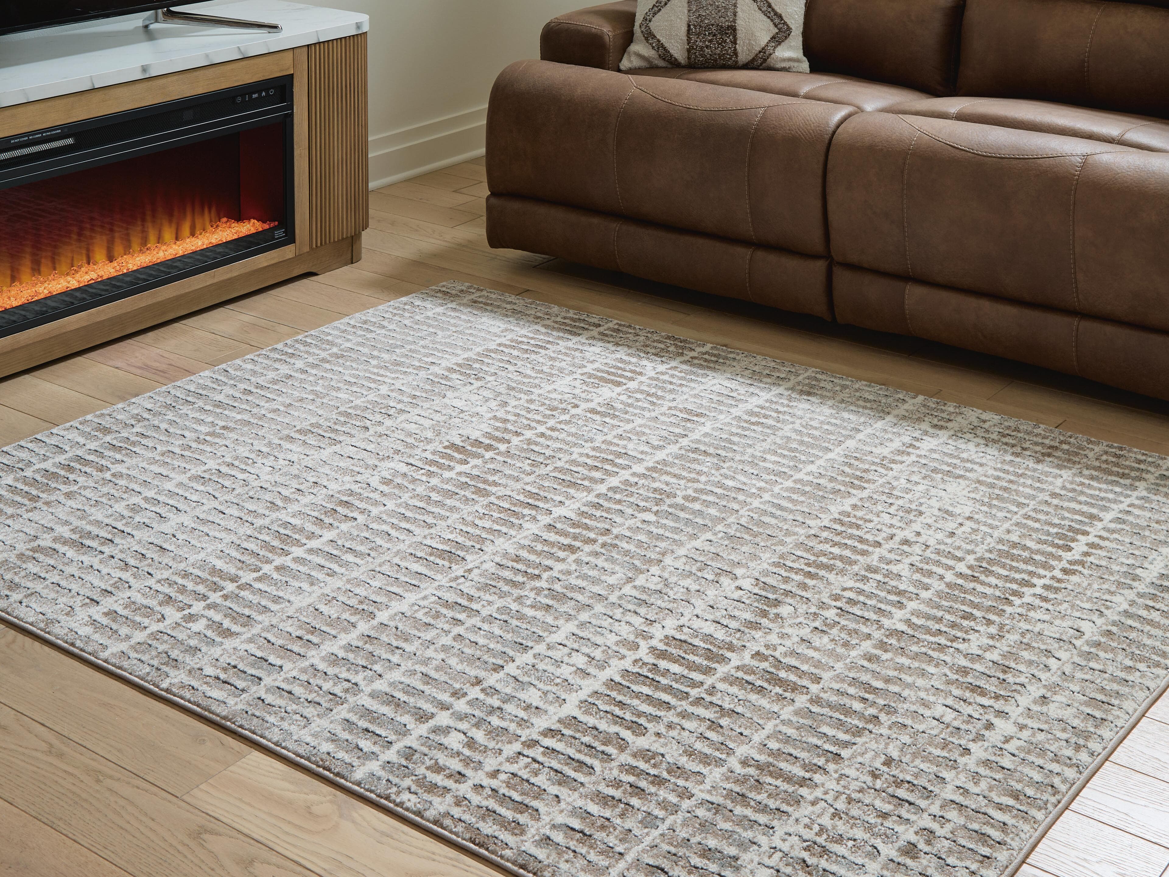 Fuadwick 5'3" X 7' Area Rug